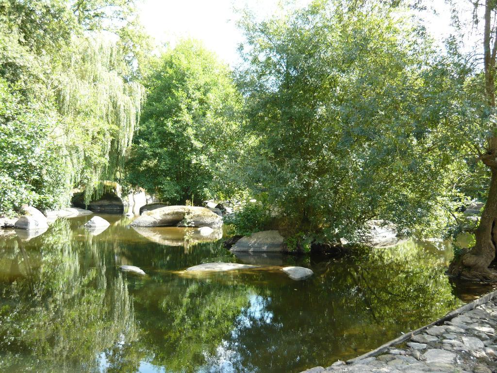 Village De Gites Du Moulin Neuf Getigne Exterior photo